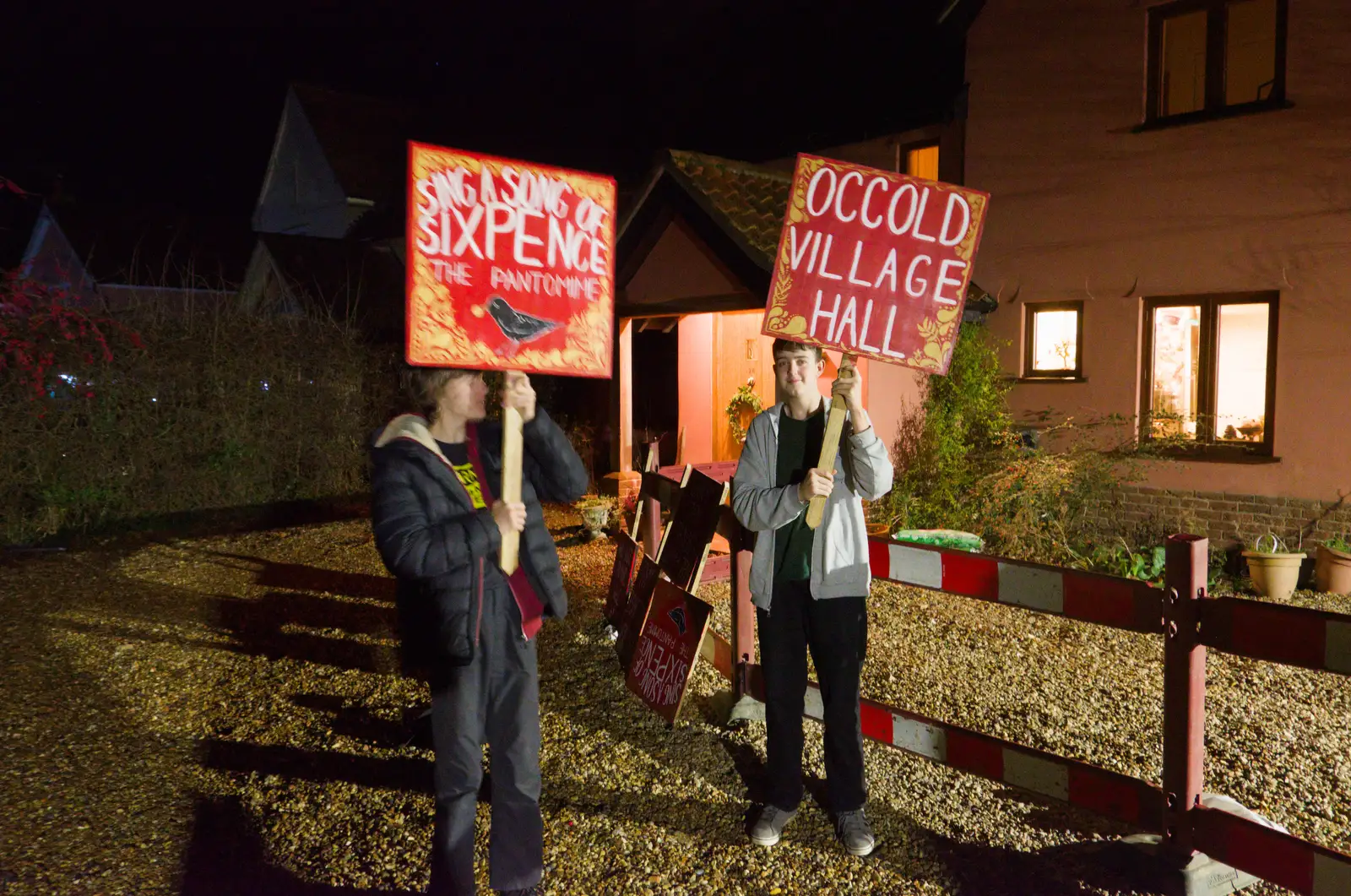 Harry and Fred wave panto signs around, from A Christmas Quiz and a Tractor Run, Brome, Suffolk - 20th December 2025