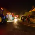 Tractors stream down the old B1077, A Christmas Quiz and a Tractor Run, Brome, Suffolk - 20th December 2025