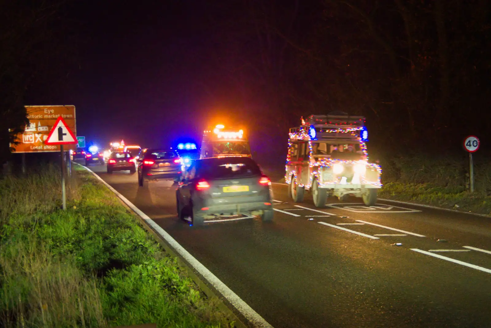 The tail end of the group is on the A140, from A Christmas Quiz and a Tractor Run, Brome, Suffolk - 20th December 2025