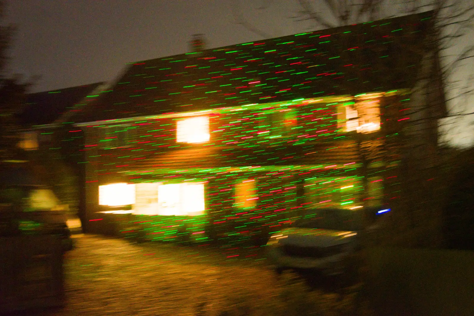 A house with projected lights all over it, from A Christmas Quiz and a Tractor Run, Brome, Suffolk - 20th December 2025