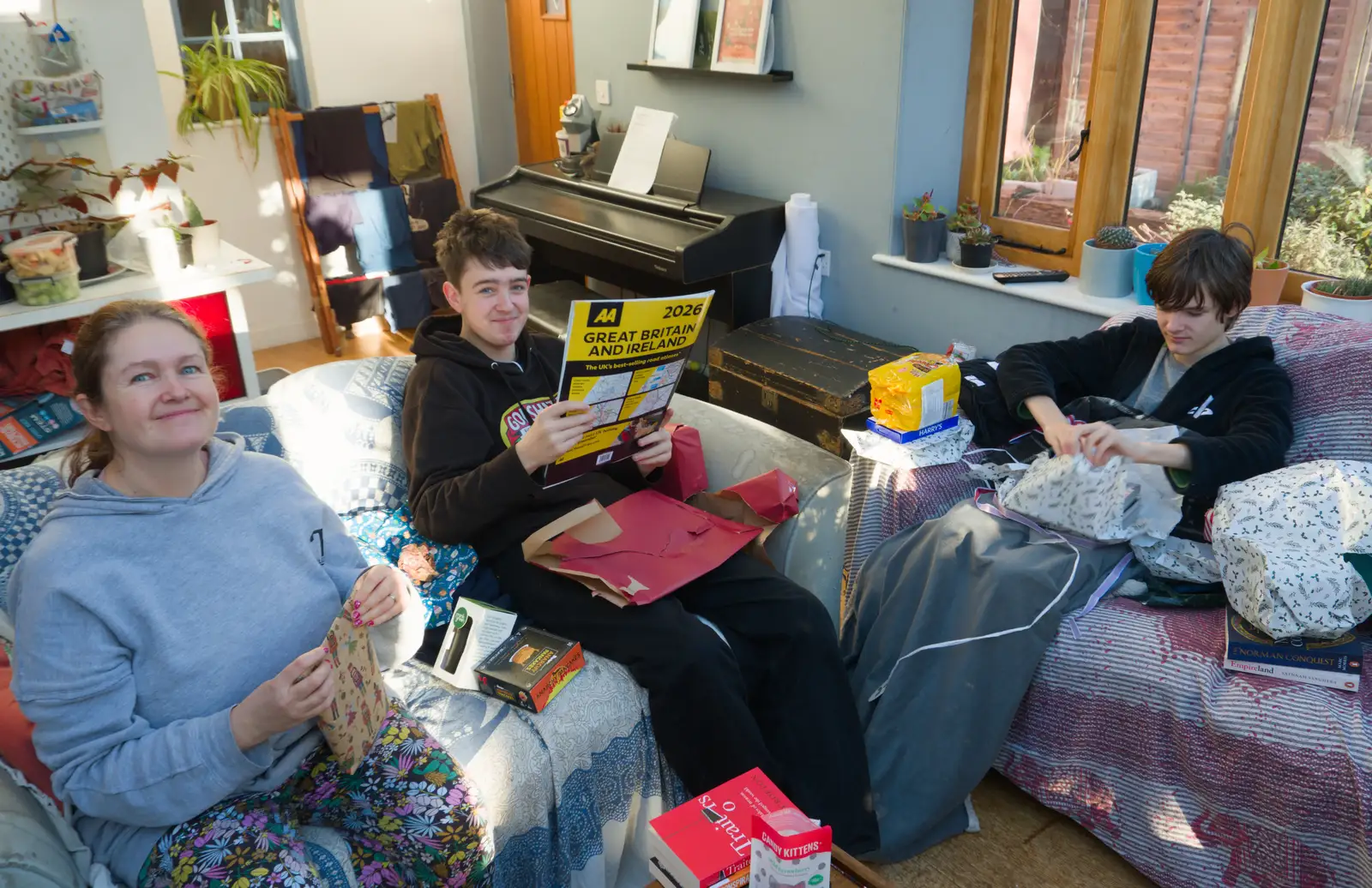 Fred's got a giant map book, from A Christmas Day Miscellany, Brome, Suffolk - 25th December 2025