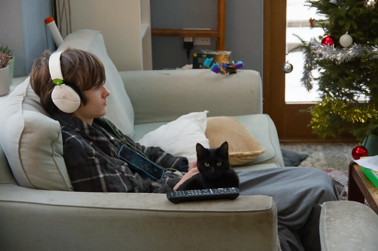 Harry's on headphones as Lilly looks over, from Harry's Snow Days, Brome, Suffolk - 5th January 2026