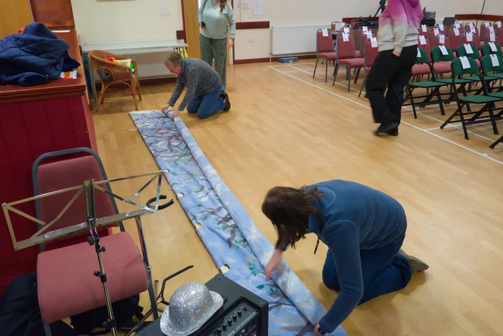 One of the stage backdrops is rolled up, from Dove Players' Pantomime, and Lunch in the Lion, Debenham - 11th January 2026