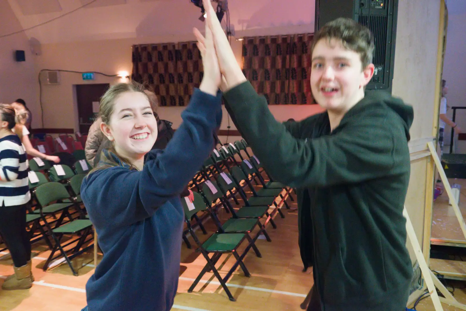 Milly and Fred do some sort of high fives, from Dove Players' Pantomime, and Lunch in the Lion, Debenham - 11th January 2026