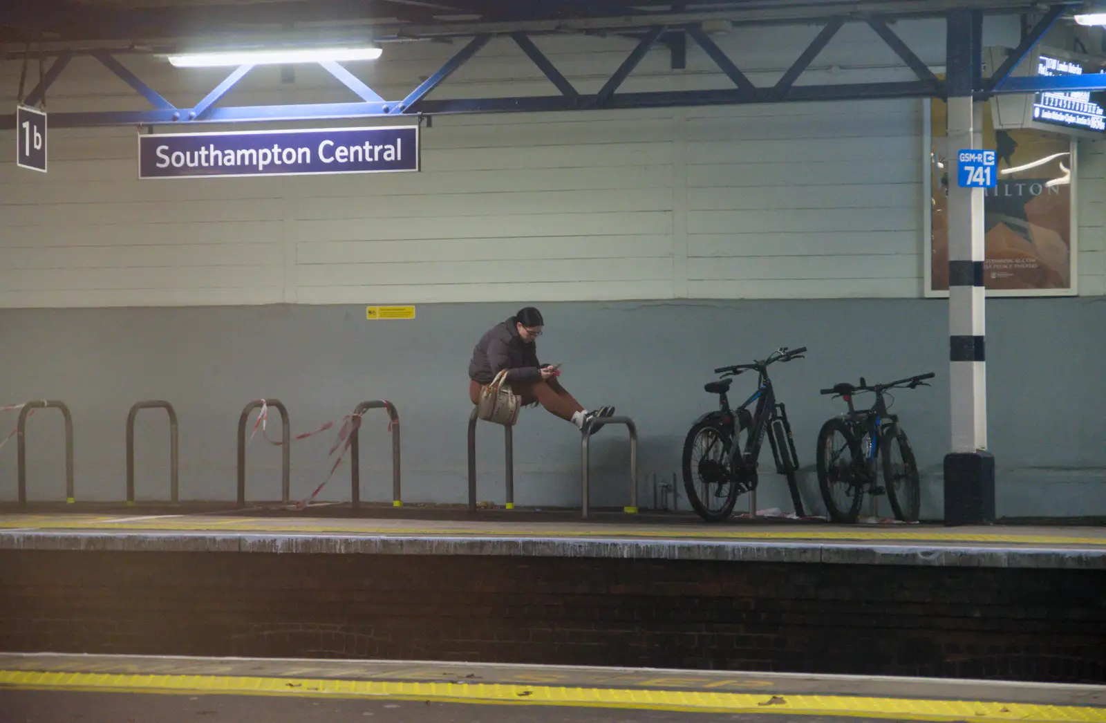 Phone messaging ennui at Southampton Station, from New Milton and a Return to Lymington, Hampshire - 17th January 2026