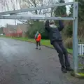 Harry dangles from the pocket park barrier, Another Walk to the Crossways, Scole, Norfolk - 25th January 2026