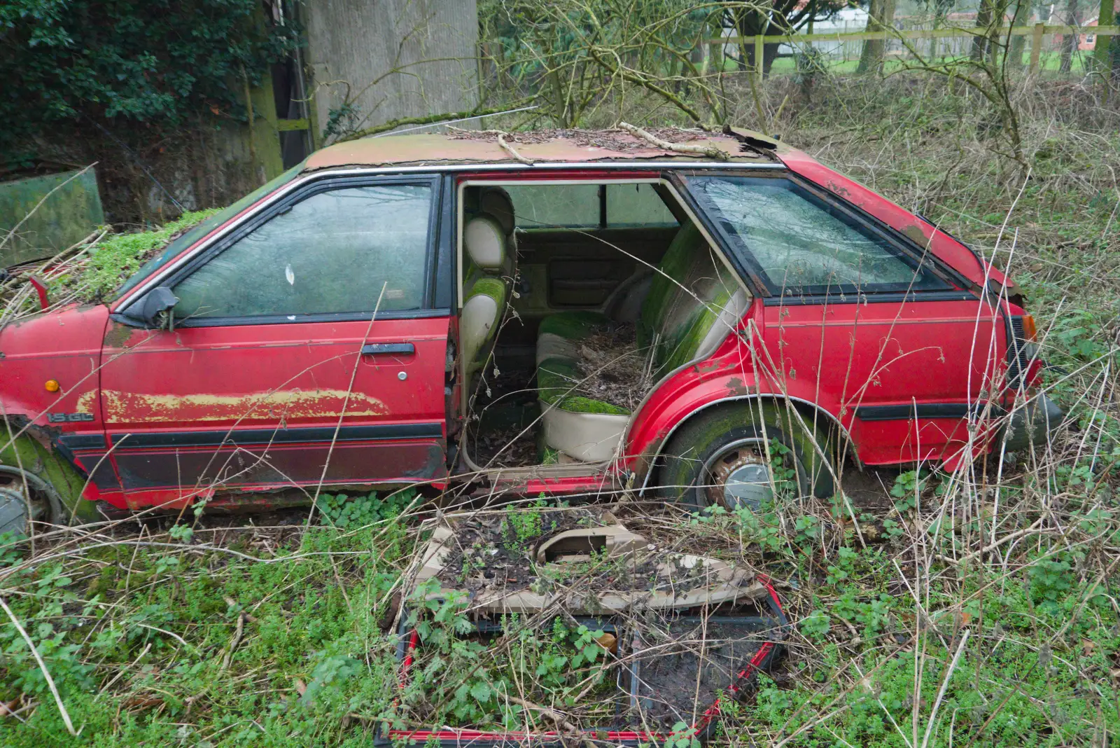 Harry spots another derelict car, from Another Walk to the Crossways, Scole, Norfolk - 25th January 2026
