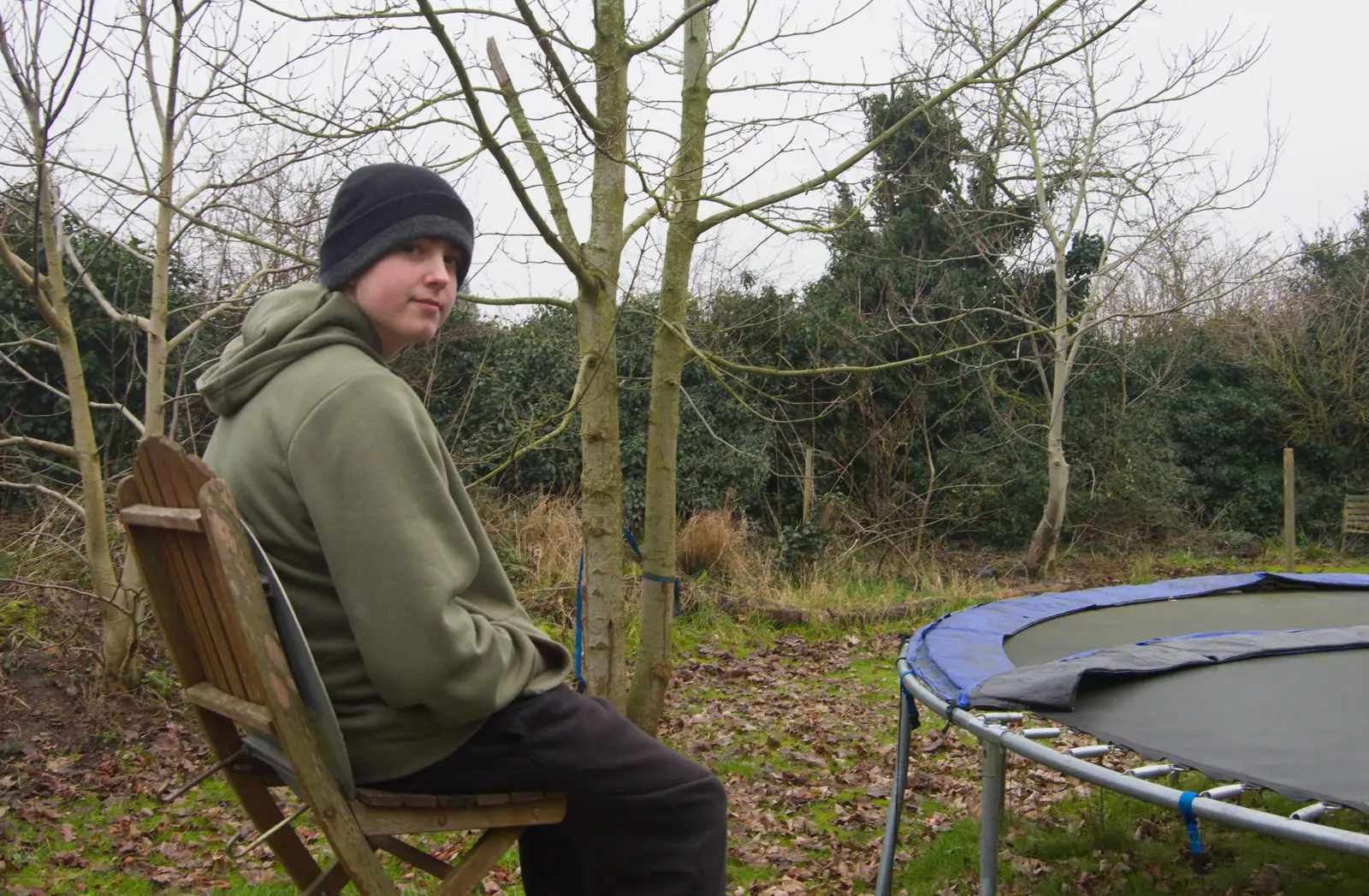 Fred on a chair by the trampoline, from Another Walk to the Crossways, Scole, Norfolk - 25th January 2026