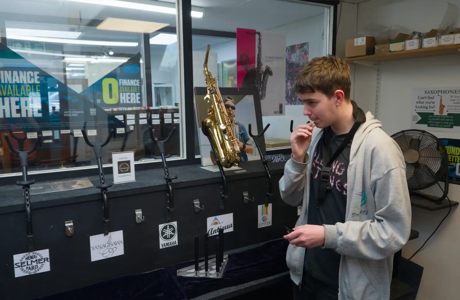 Fred gets a reed ready in the testing room, from Saxophone Shopping in Cambridge - 21st March 2026