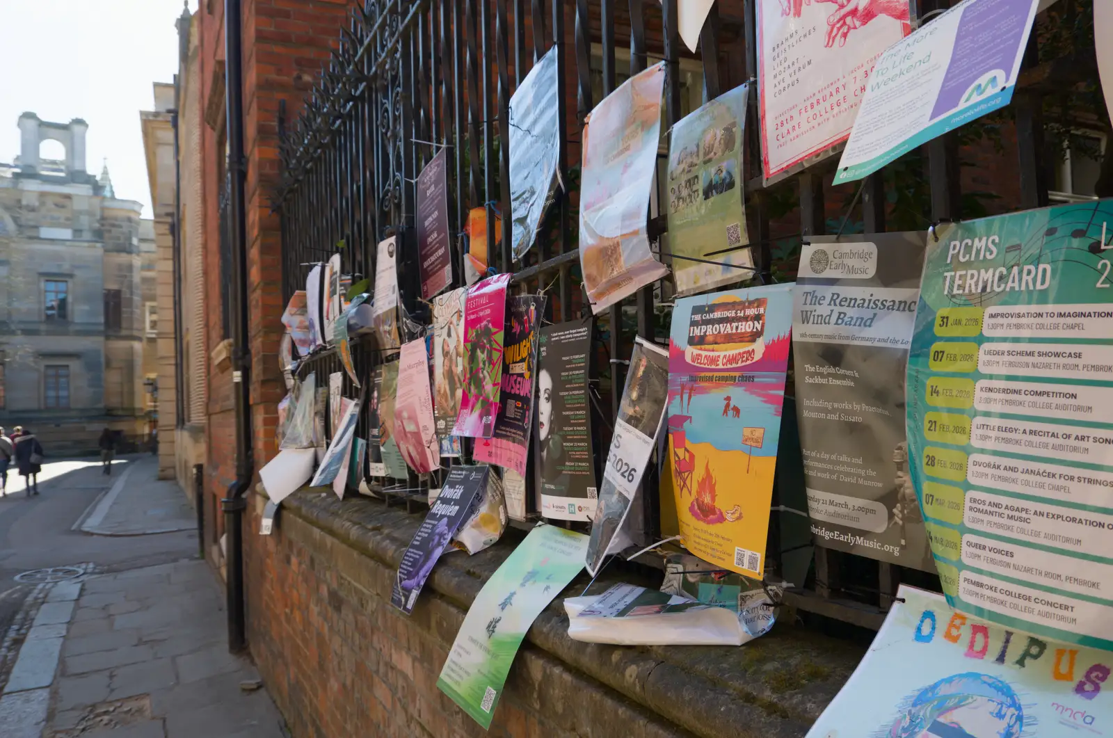 More poster chaos on the railings, from Saxophone Shopping in Cambridge - 21st March 2026