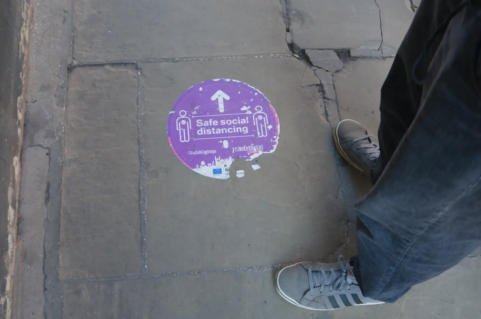 A Covid-era sticker on Trinity Street, from Saxophone Shopping in Cambridge - 21st March 2026