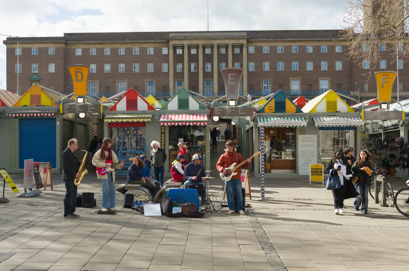 A four-piece band in front of the market, from Hospital Trips to Norwich, Norfolk - 25th March 2026