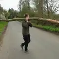 Fred carries his log across Rectory Road, Walking Around, and Fred's Log, Brome, Suffolk - 3rd April 2026