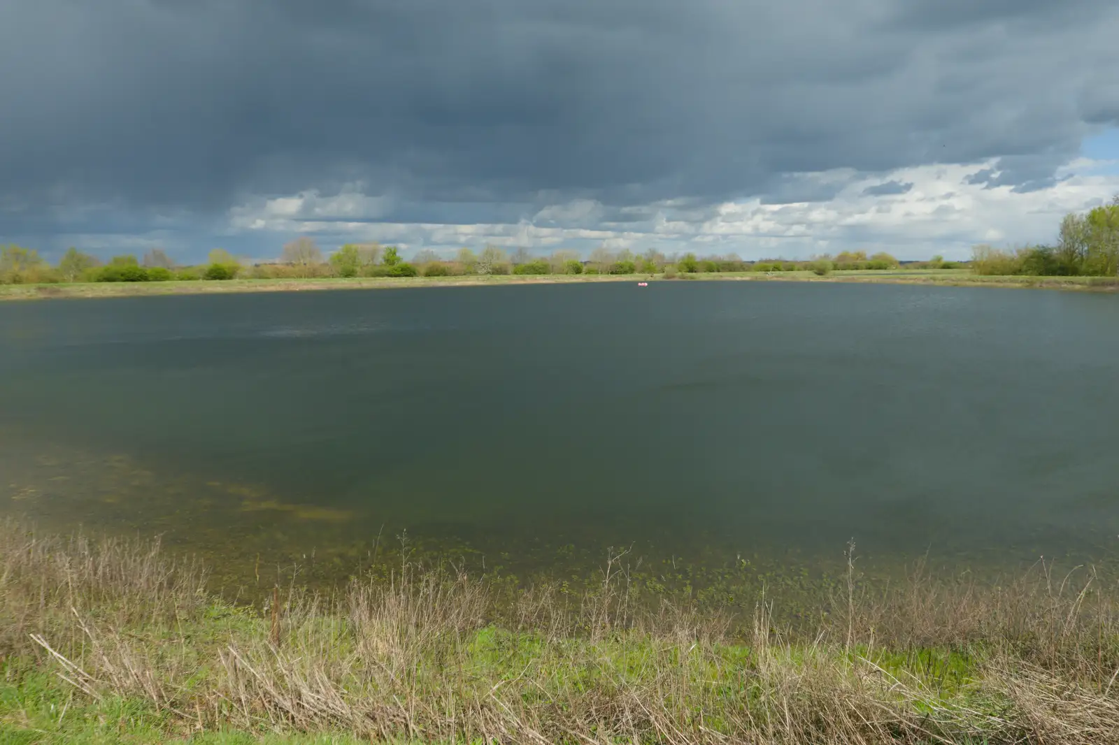 The resevoir looks black under dark skies, from Walking Around, and Fred's Log, Brome, Suffolk - 3rd April 2026