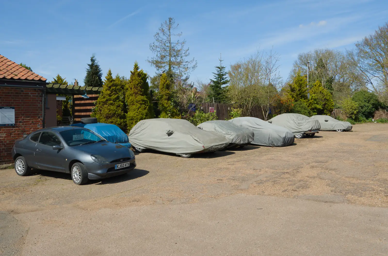 A large array of covered cars in the pub cark park, from A Visit to Winterton-on-Sea, Norfolk - 6th April 2026