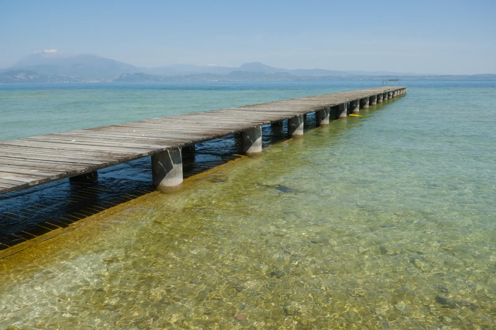 A pier heads out into the lake, from Hauling Boats to Croatia: Toulon to Desenzano, Lake Garda, Italy - 11th April 2026