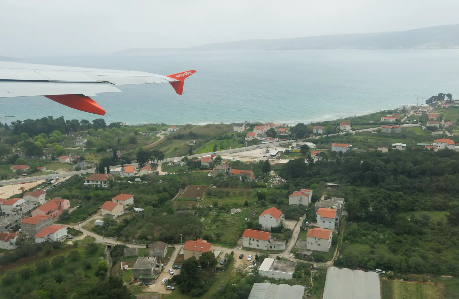 The building of Split as the plane takes off, from Hauling Boats to Croatia: The Journey Home - 15th April 2026