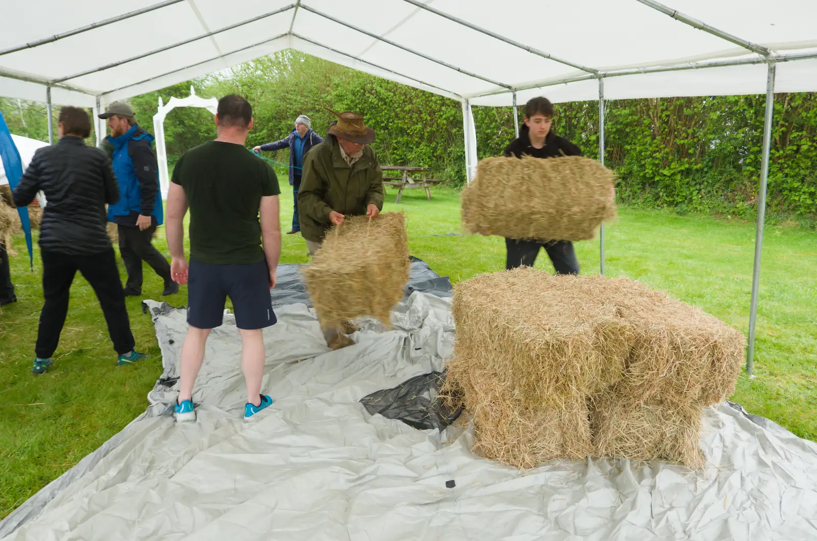 Fred helps to move straw bales into the marquee, from Lunch in South Molton and Sean's "Stag Night", King's Nympton, Devon - 2nd May 2026