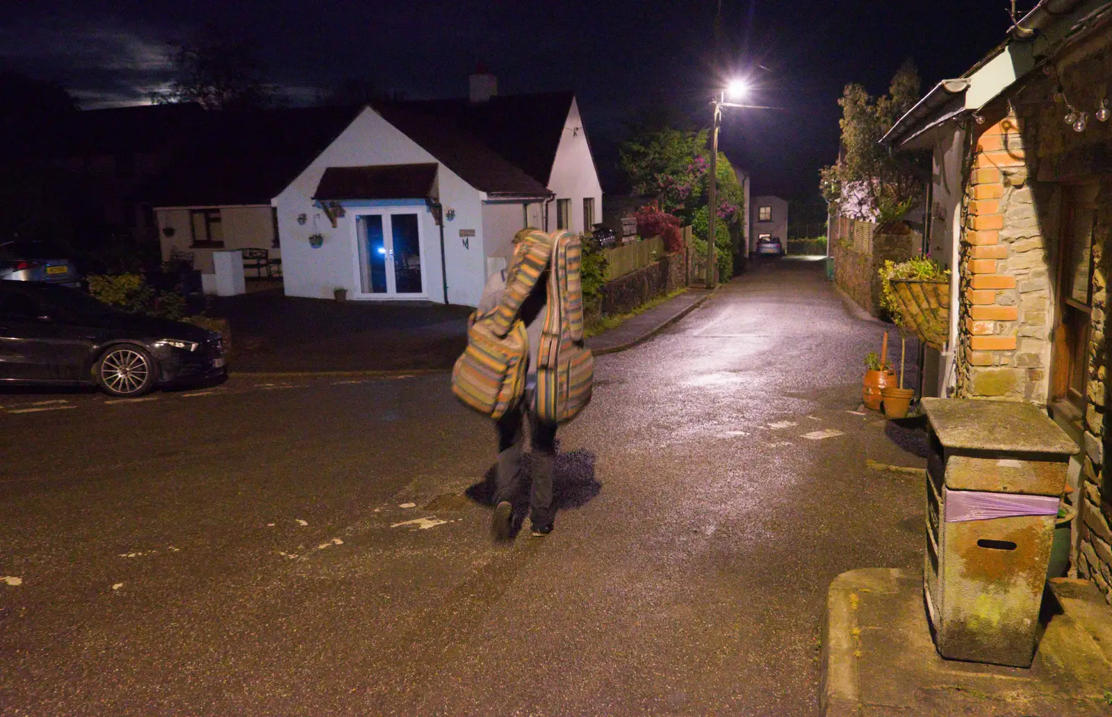 Sean wanders off with two guitars, from Lunch in South Molton and Sean's "Stag Night", King's Nympton, Devon - 2nd May 2026