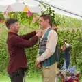 The photographer makes an adjustment to Sean, Hannah and Sean's Wedding, King's Nympton, Devon - 3rd May 2026
