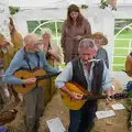 The folk band accompanies the exit, Hannah and Sean's Wedding, King's Nympton, Devon - 3rd May 2026