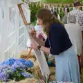 Someone contributes to the community painting, Hannah and Sean's Wedding, King's Nympton, Devon - 3rd May 2026