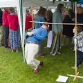 Outside, a bit of limbo is happening, Hannah and Sean's Wedding, King's Nympton, Devon - 3rd May 2026