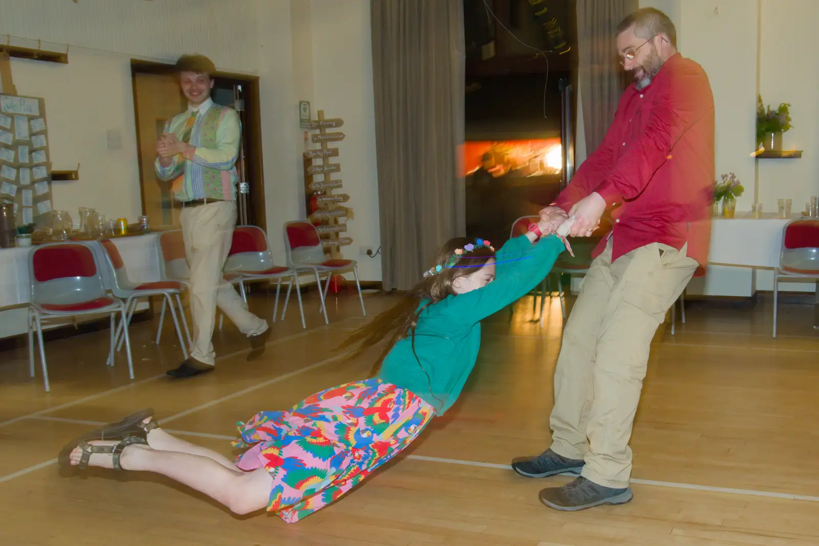 A small girl gets swung around, from Hannah and Sean's Wedding, King's Nympton, Devon - 3rd May 2026
