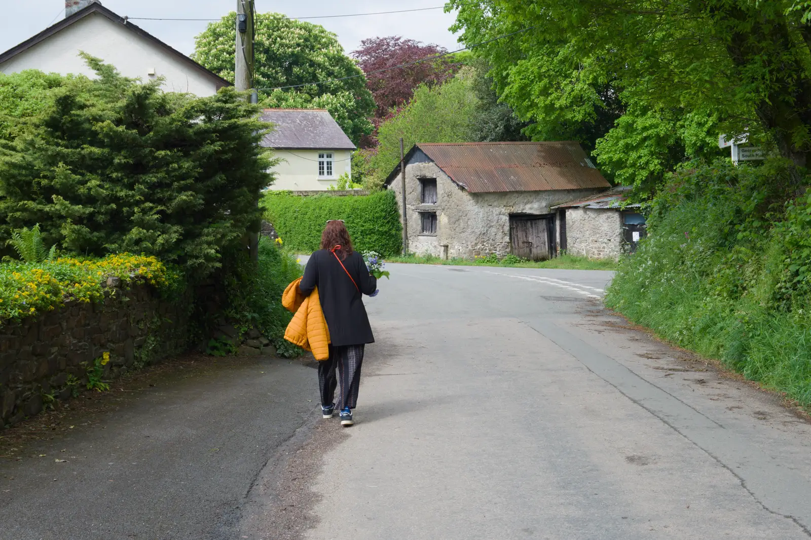 Isobel heads back with some flowers, from A Visit to the Cottage and Lunch With Sis, Throwleigh, Devon - 4th May 2026
