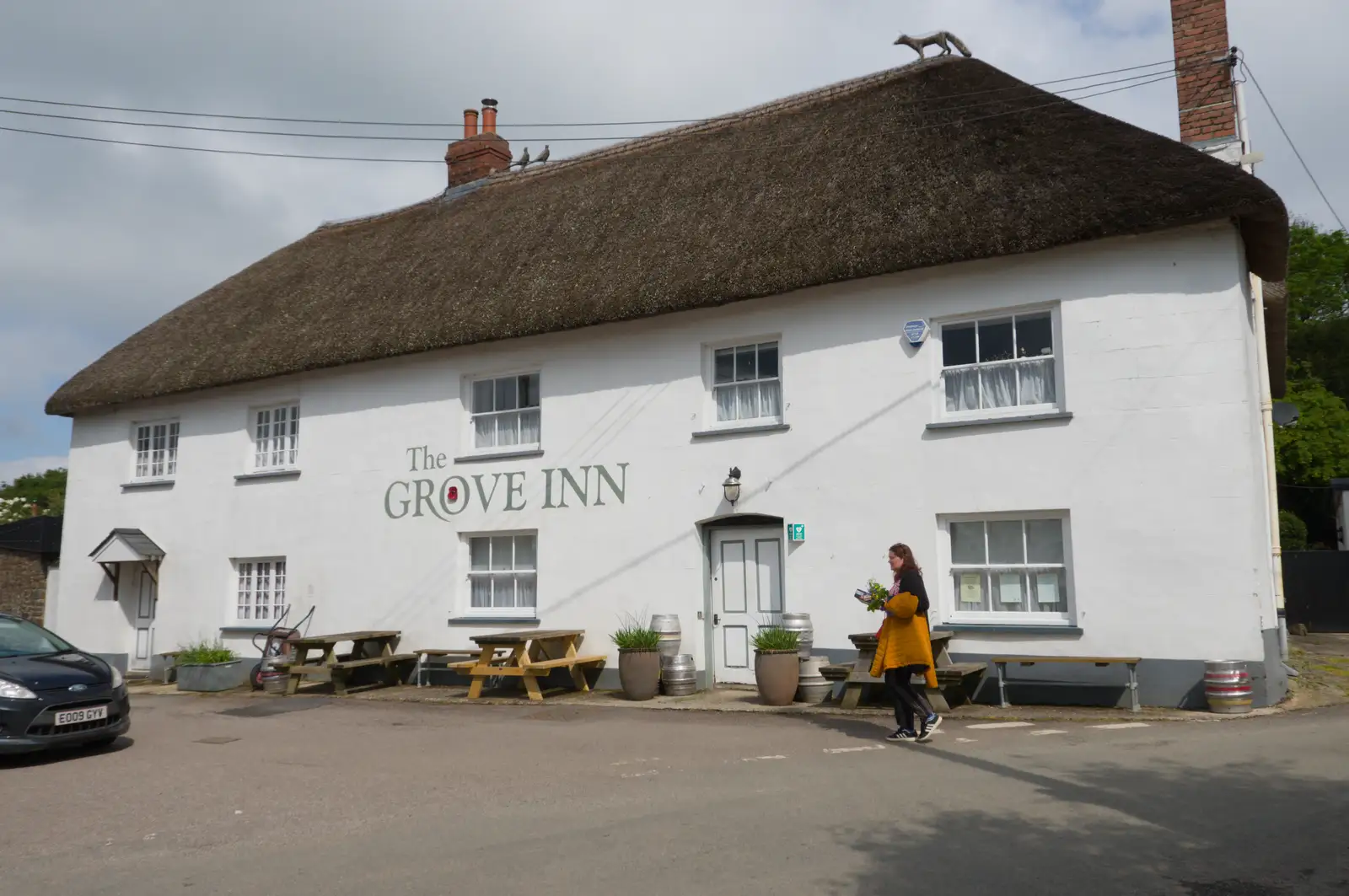 Isobel walks past the excellent Grove Inn, from A Visit to the Cottage and Lunch With Sis, Throwleigh, Devon - 4th May 2026