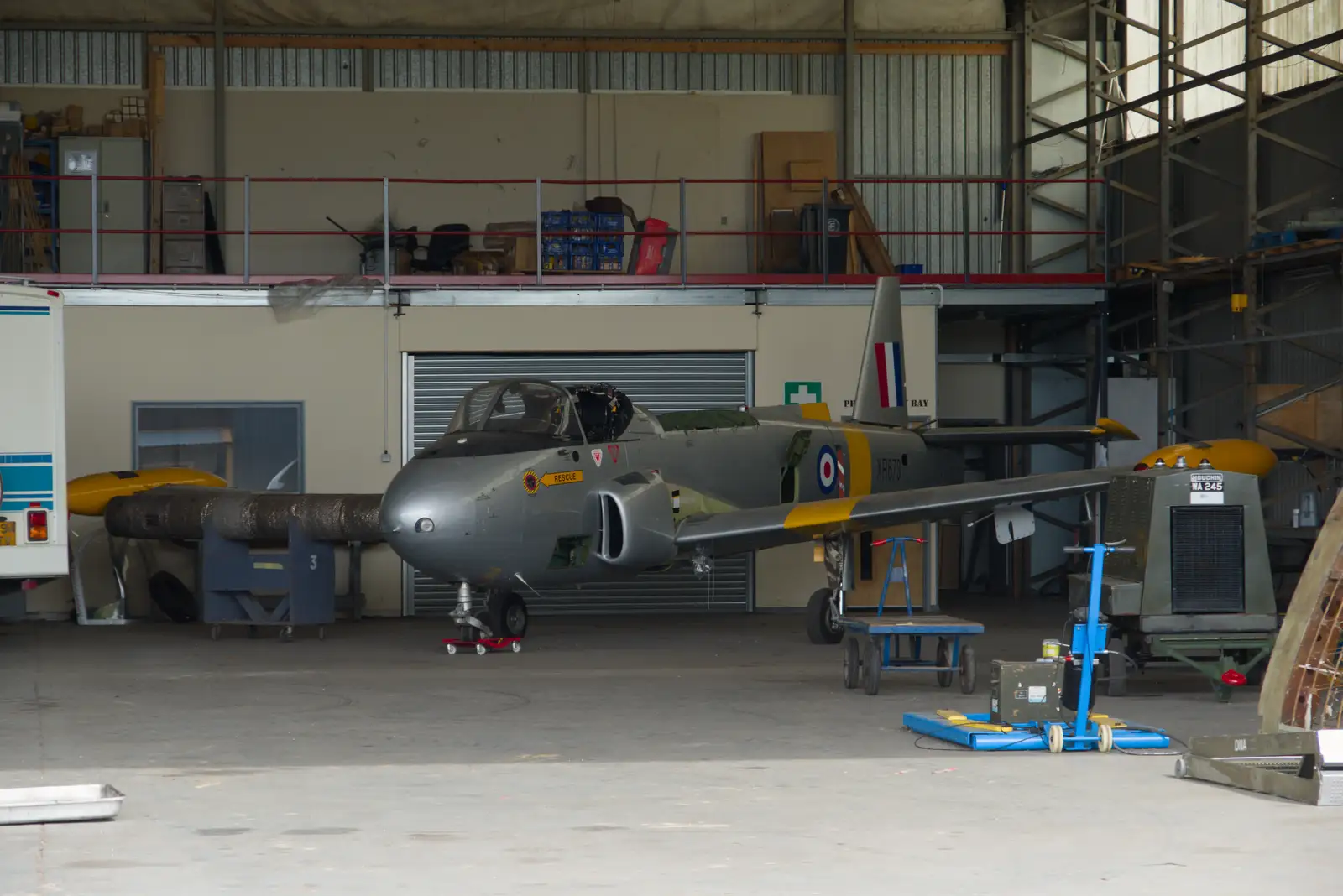 There's a Provost trainer in a hangar, from Flying to Cherbourg on a C-47 Dakota, Normandy, France - 1st June 2026