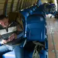 Clive checks his phone out, Flying to Cherbourg on a C-47 Dakota, Normandy, France - 1st June 2026