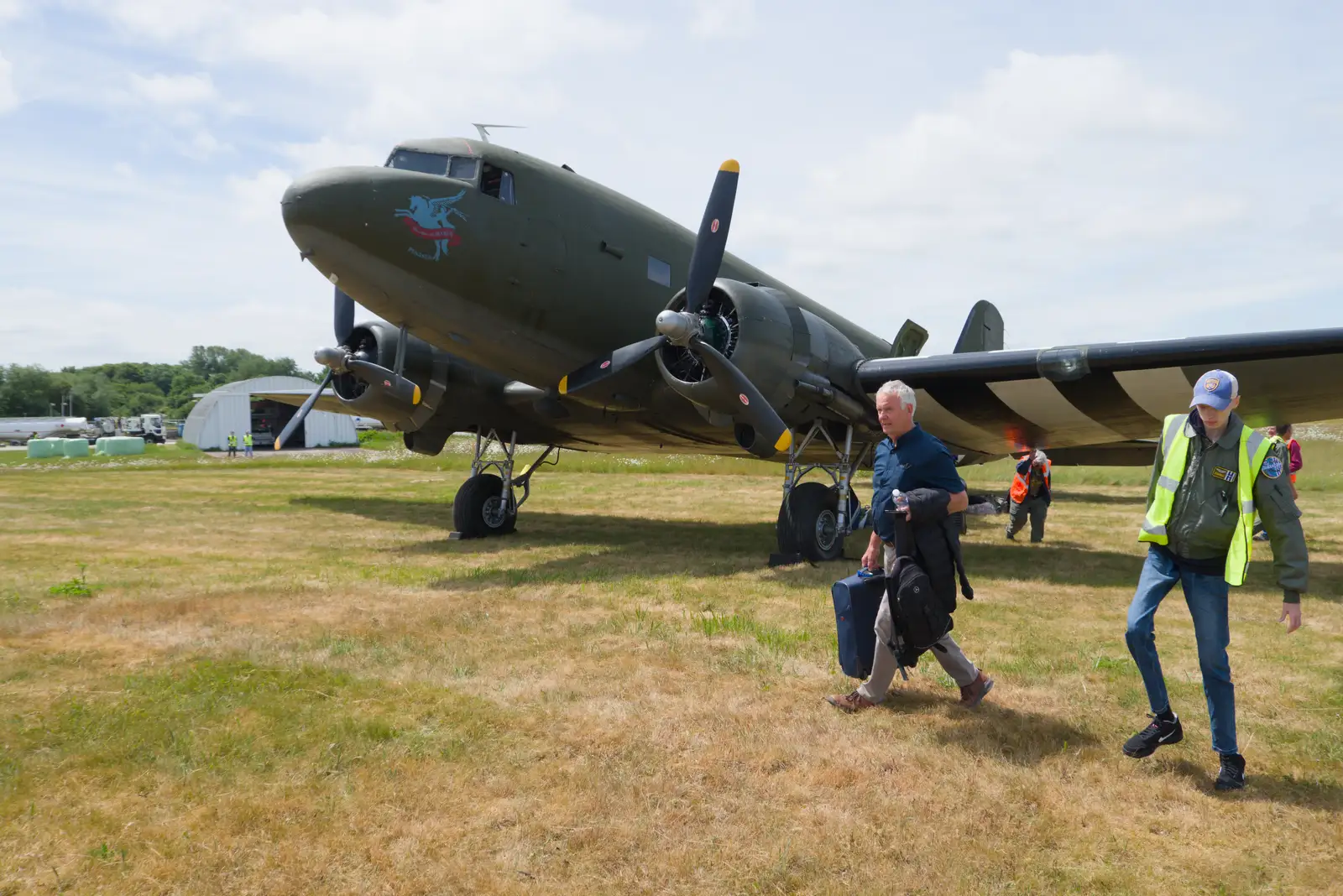 Robert hauls his case away, from Flying to Cherbourg on a C-47 Dakota, Normandy, France - 1st June 2026