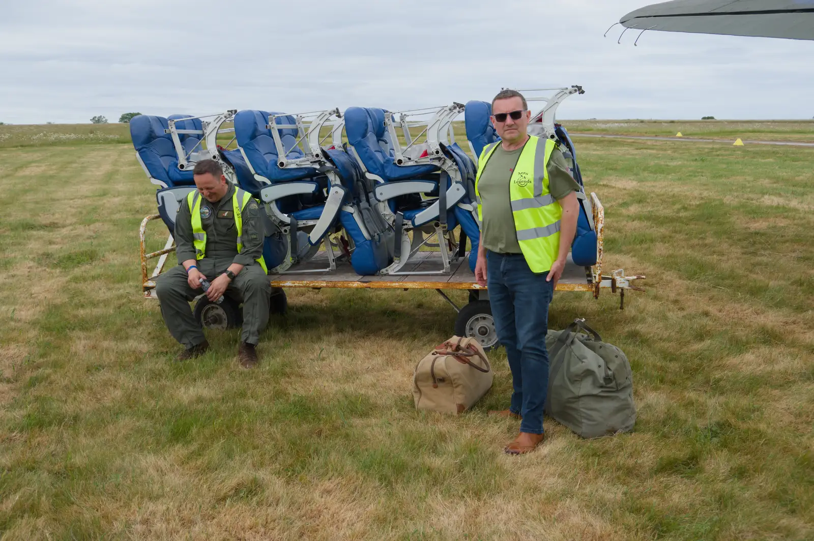 The seats are on a trailer next to the plane, from Flying to Cherbourg on a C-47 Dakota, Normandy, France - 1st June 2026