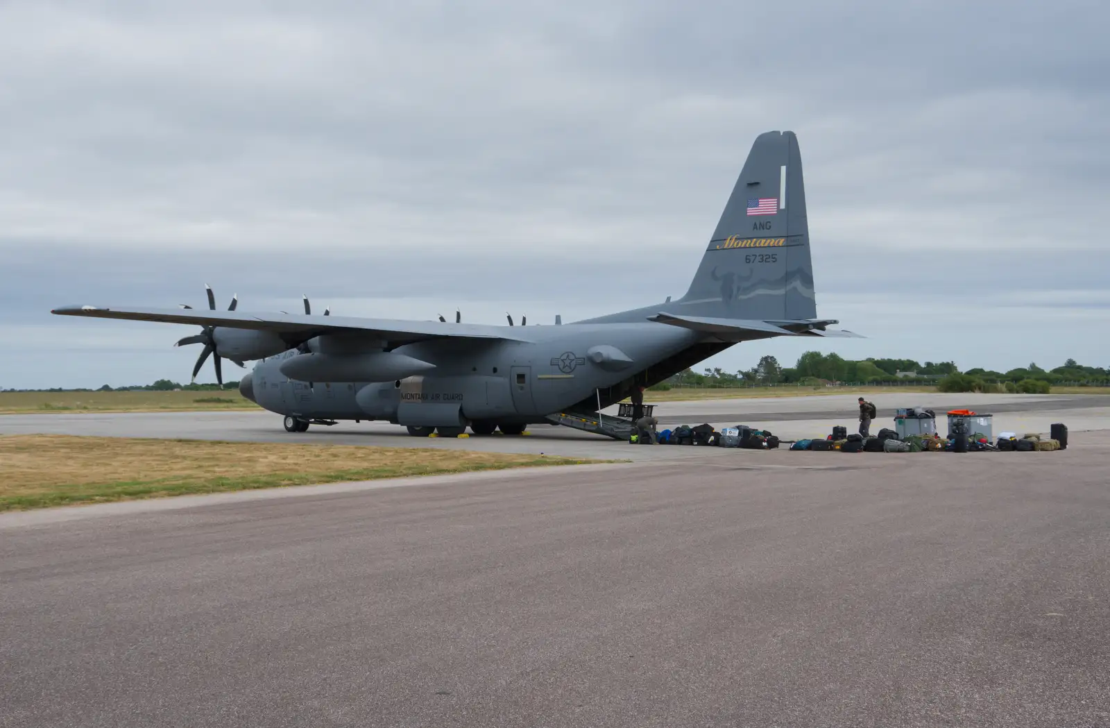 A Hercules from Montana is also unloading, from Flying to Cherbourg on a C-47 Dakota, Normandy, France - 1st June 2026