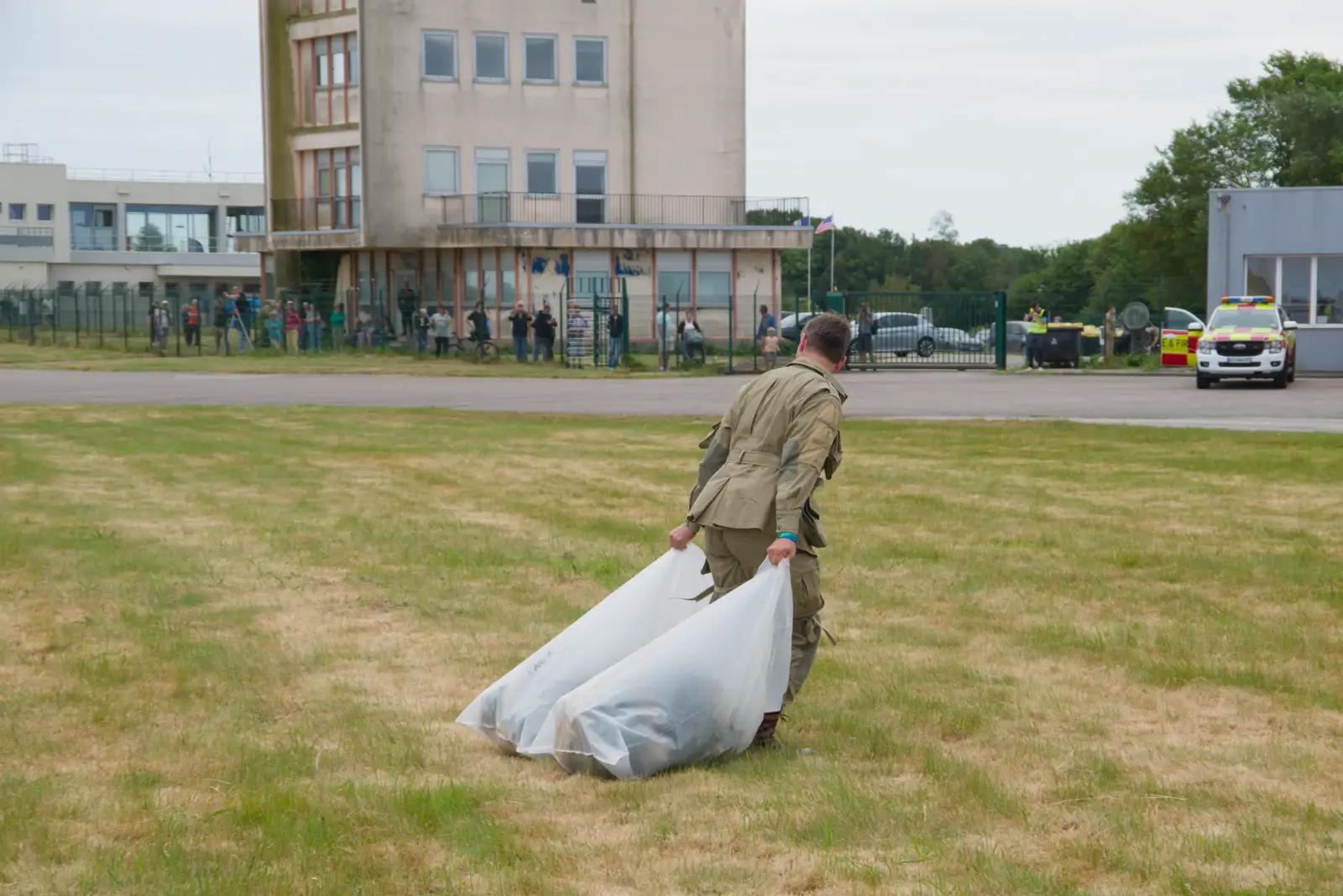The previous session's static lines are hauled off, from Flying to Cherbourg on a C-47 Dakota, Normandy, France - 1st June 2026