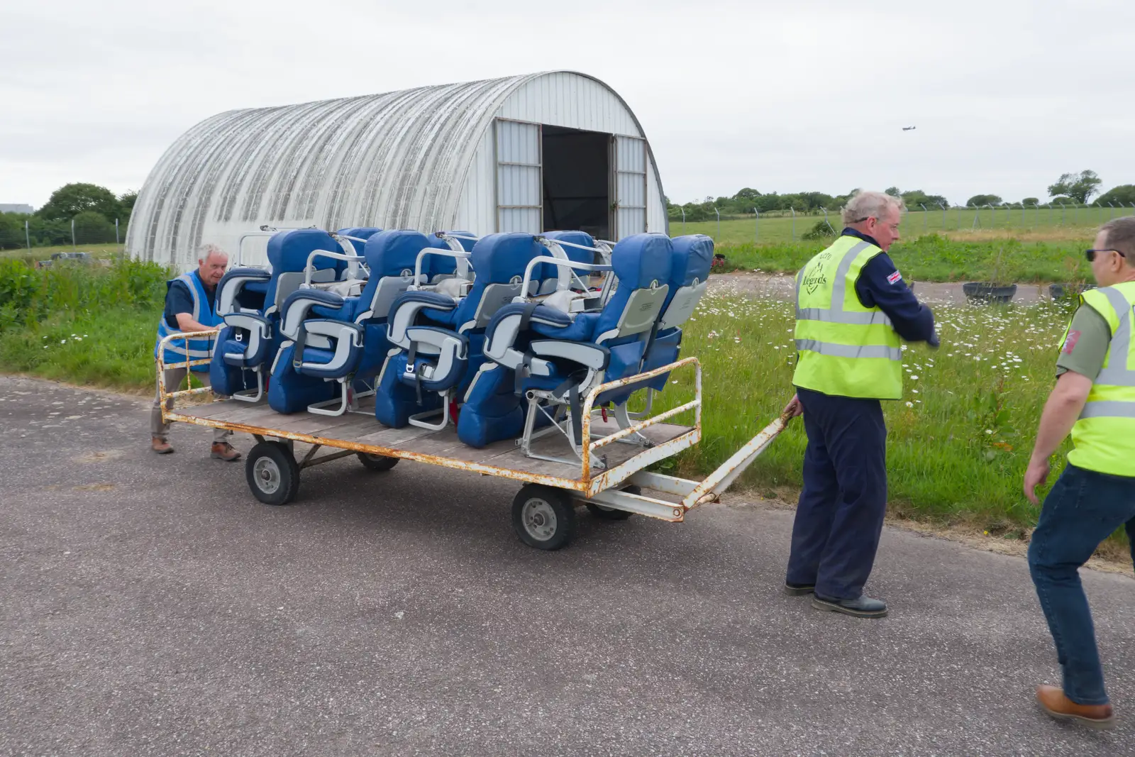 We push Pegasus's seats into a nearby hangar, from Flying to Cherbourg on a C-47 Dakota, Normandy, France - 1st June 2026