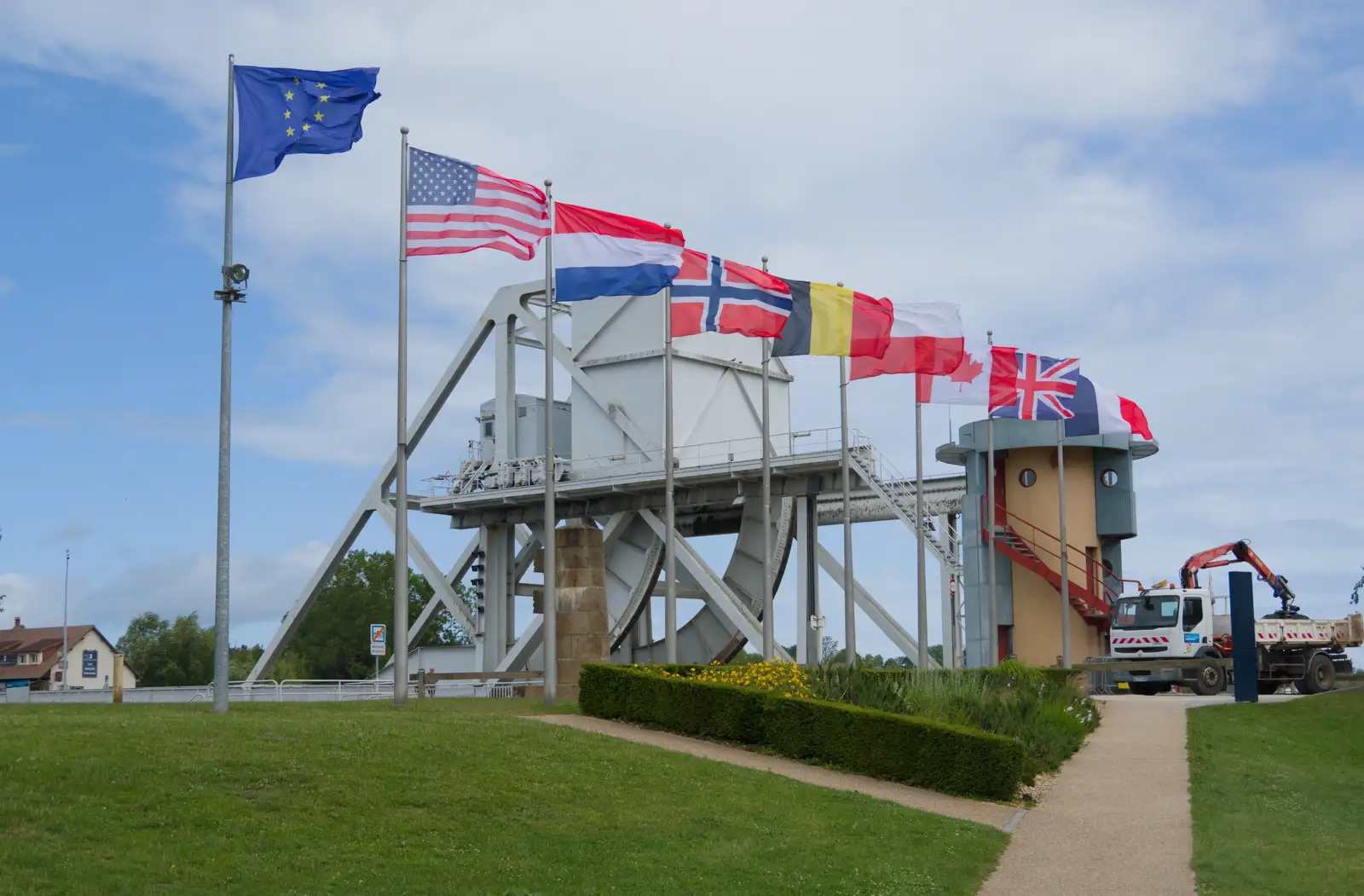 Flags of nations, from Pegasus Bridge, the British Memorial and Arromaches, Normandy - 2nd June 2026