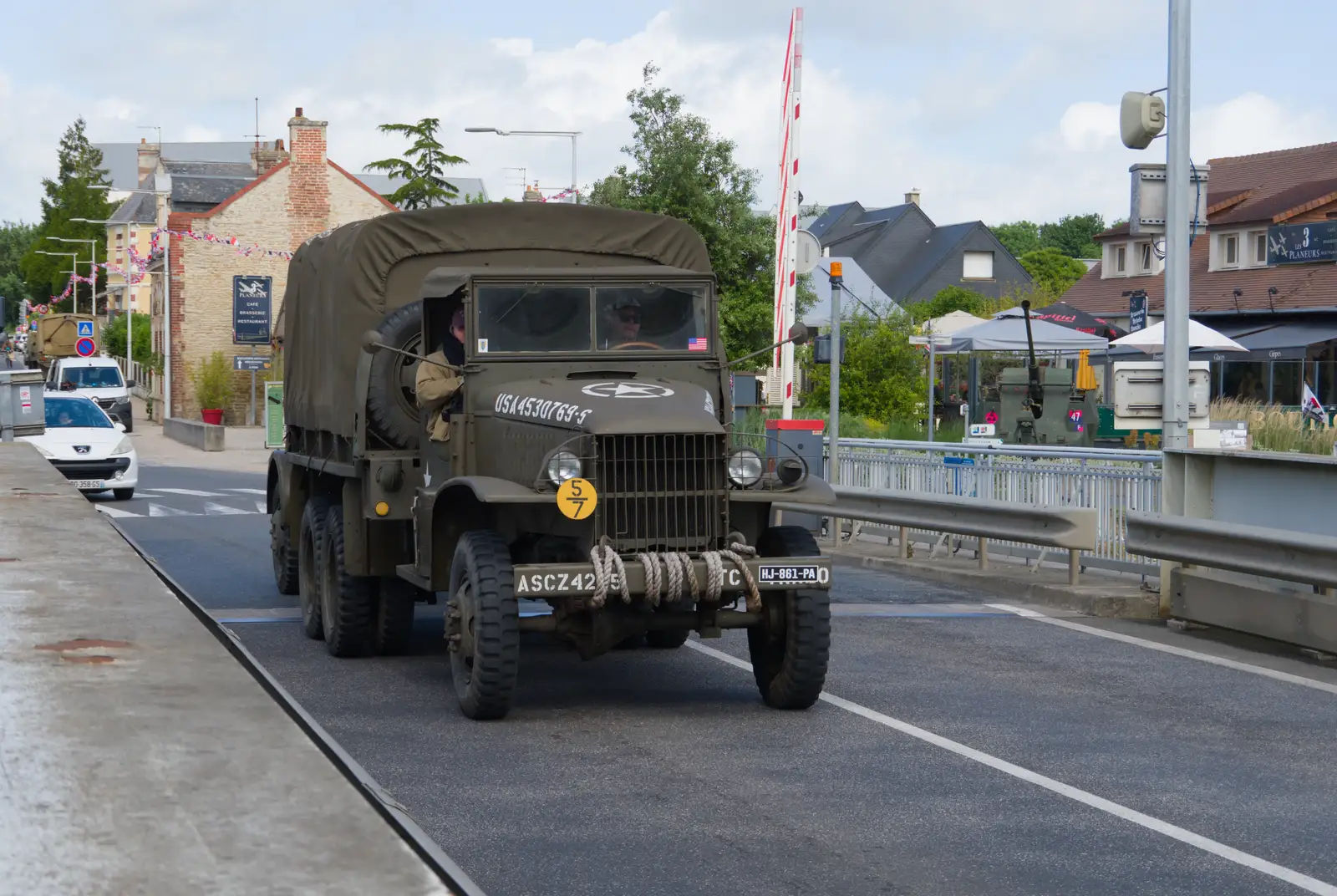 A six-by-six rumbles over the bridge at Bénouville, from Pegasus Bridge, the British Memorial and Arromaches, Normandy - 2nd June 2026