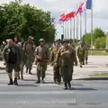 A bunch of re-enactors cross the road, Pegasus Bridge, the British Memorial and Arromaches, Normandy - 2nd June 2026