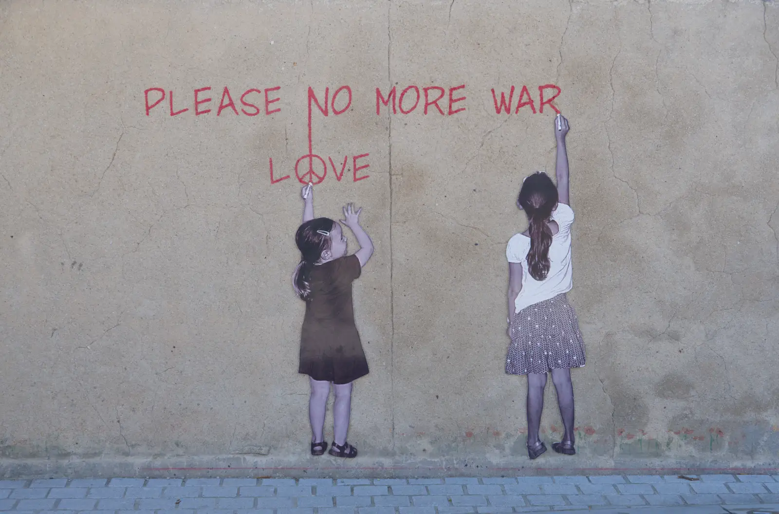 Banksy-esque graffiti on a wall, from Pegasus Bridge, the British Memorial and Arromaches, Normandy - 2nd June 2026