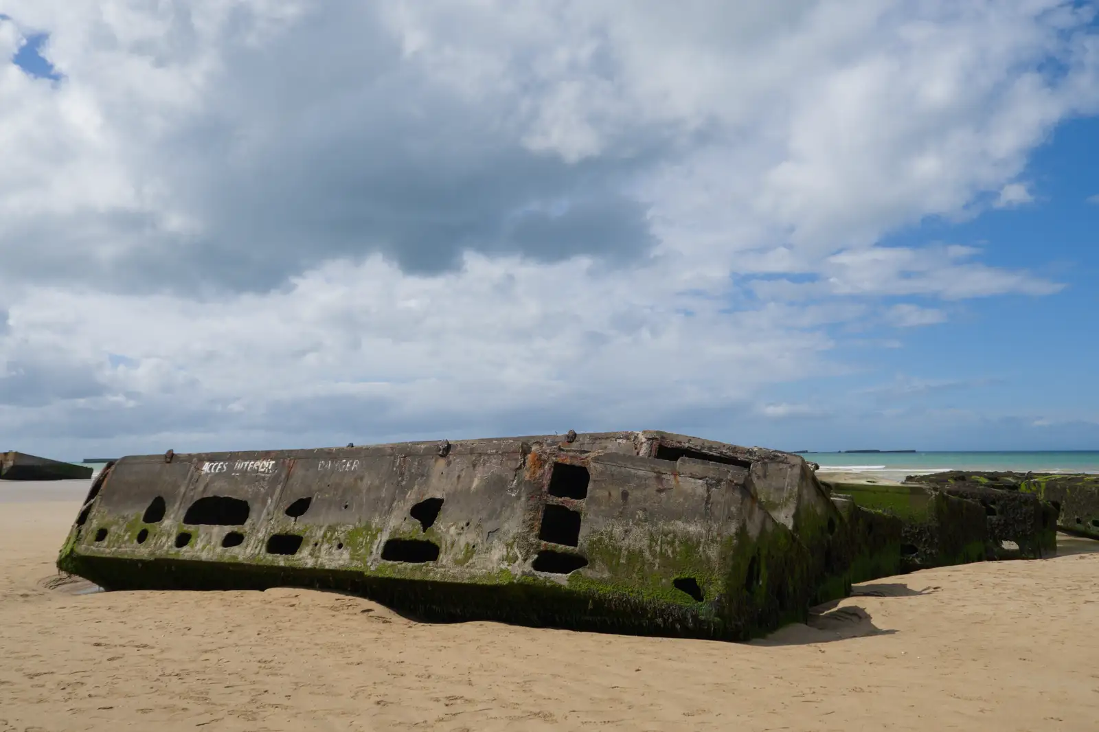 A stack of Mulberry components on the beach, from Pegasus Bridge, the British Memorial and Arromaches, Normandy - 2nd June 2026