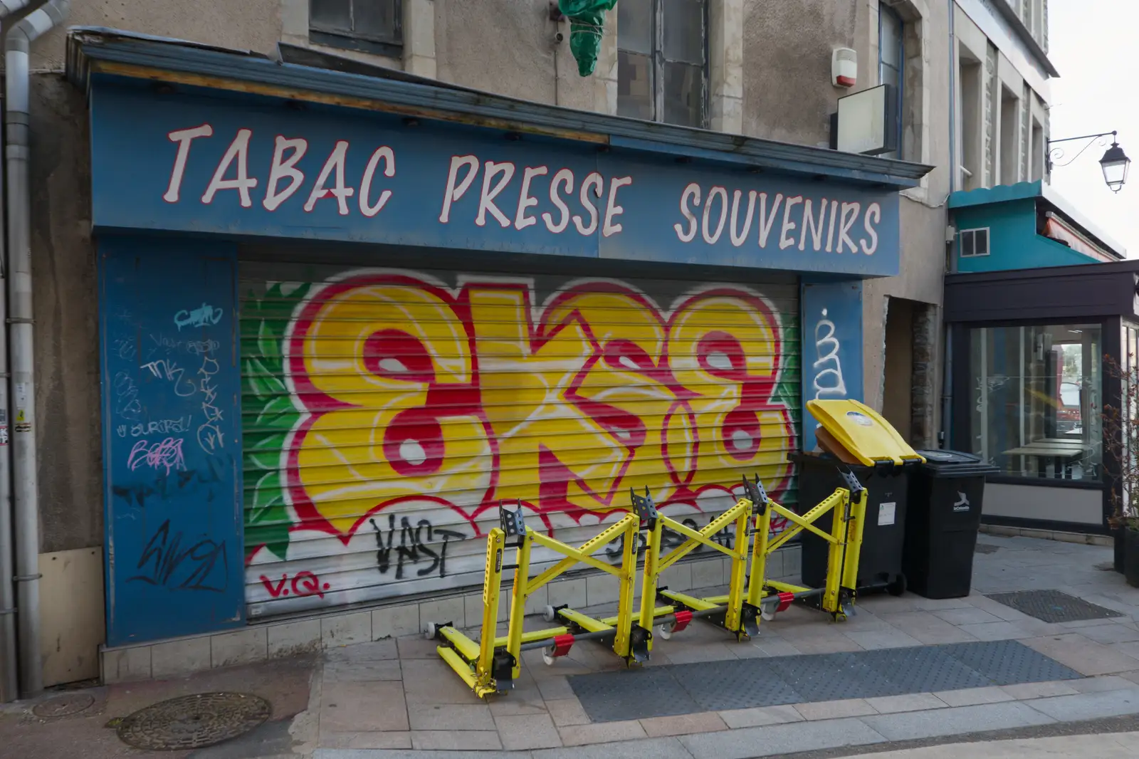 A colourful tag on roller shutters, from Pegasus Bridge, the British Memorial and Arromaches, Normandy - 2nd June 2026