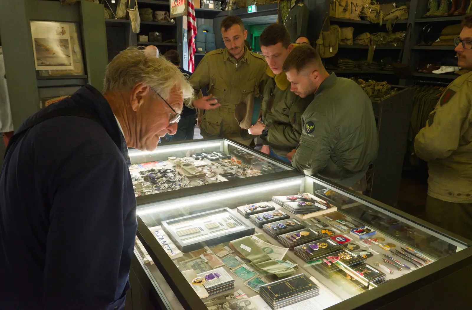 Paul looks at memorabilia in Dead Man's Corner, from Sainte-Mère-Élgise and Saint-Côme-du-Mont, Normandy, France - 3rd June 2026