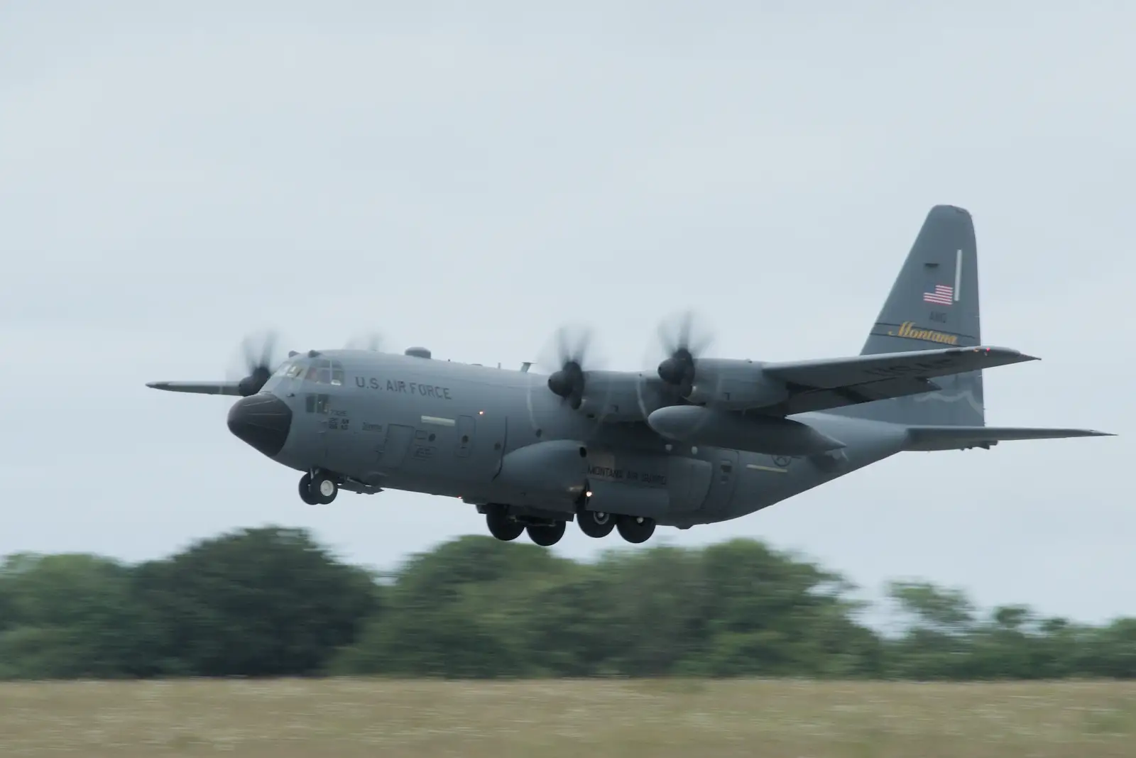 The Montana ANG Hercules takes off, from Sainte-Mère-Élgise and Saint-Côme-du-Mont, Normandy, France - 3rd June 2026