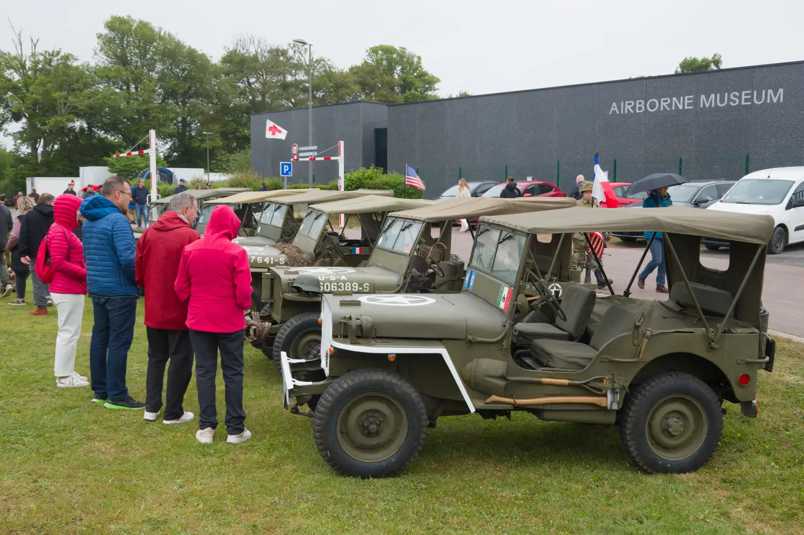 A line of Willys jeeps by the Airborne Museum, from Sainte-Mère-Élgise and Saint-Côme-du-Mont, Normandy, France - 3rd June 2026