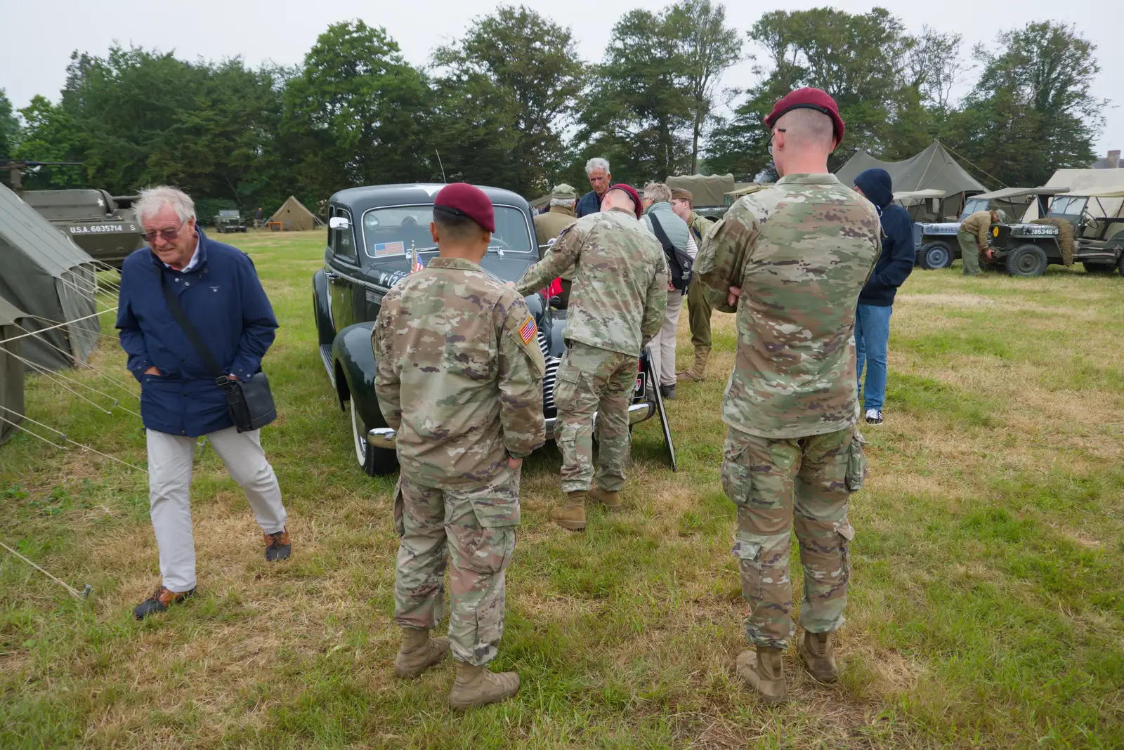 Paul walks past some military dudes, from Sainte-Mère-Élgise and Saint-Côme-du-Mont, Normandy, France - 3rd June 2026