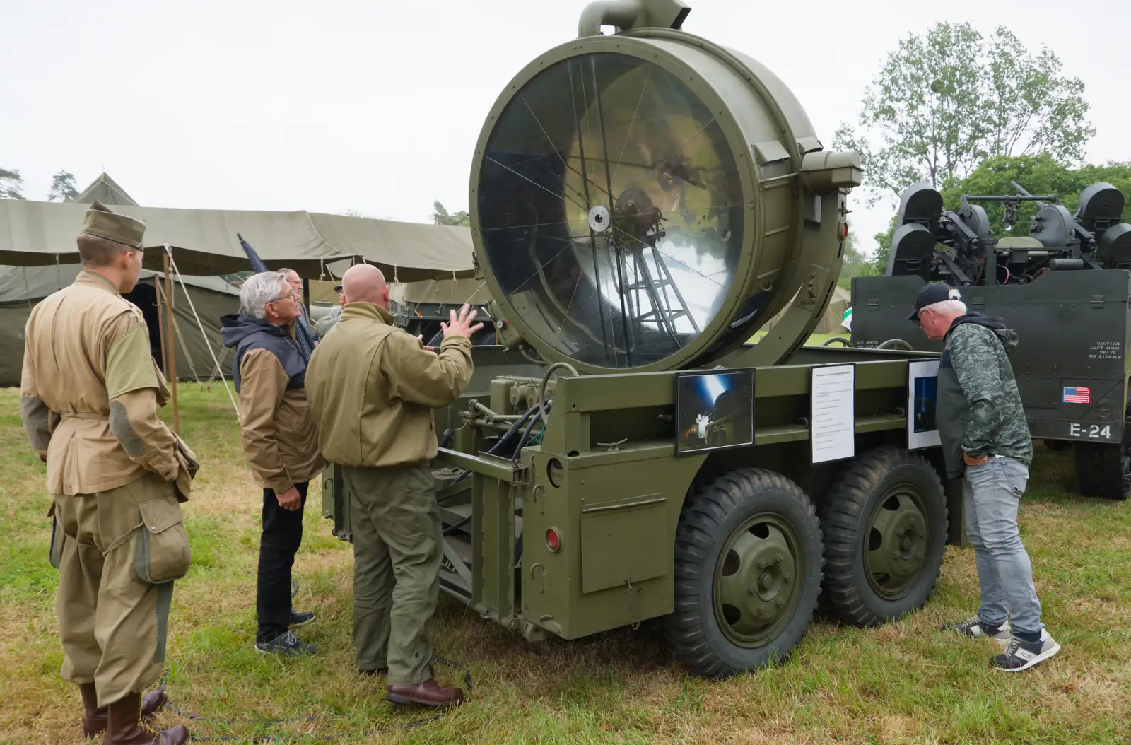 People mess around with a giant searchlight, from Sainte-Mère-Élgise and Saint-Côme-du-Mont, Normandy, France - 3rd June 2026