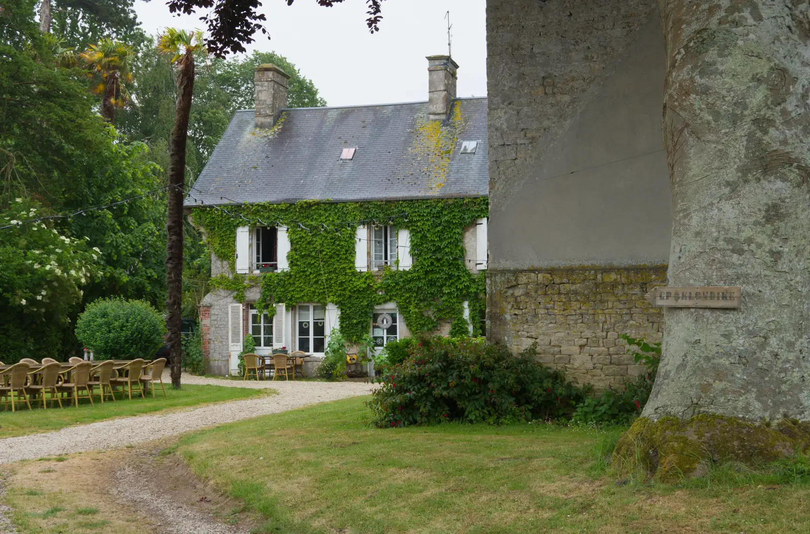 An ivy-covered house called Klondike, from Sainte-Mère-Élgise and Saint-Côme-du-Mont, Normandy, France - 3rd June 2026