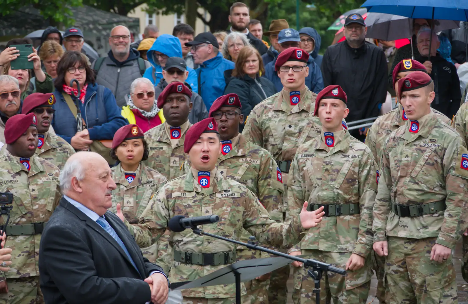 The 82nd Airborne bizarrely start singing, from Sainte-Mère-Élgise and Saint-Côme-du-Mont, Normandy, France - 3rd June 2026